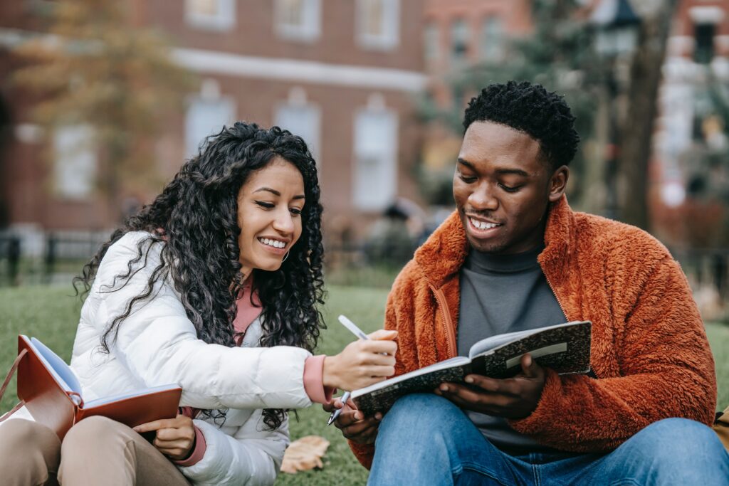 two students studying for their college examination—a requirement for the types of college degree