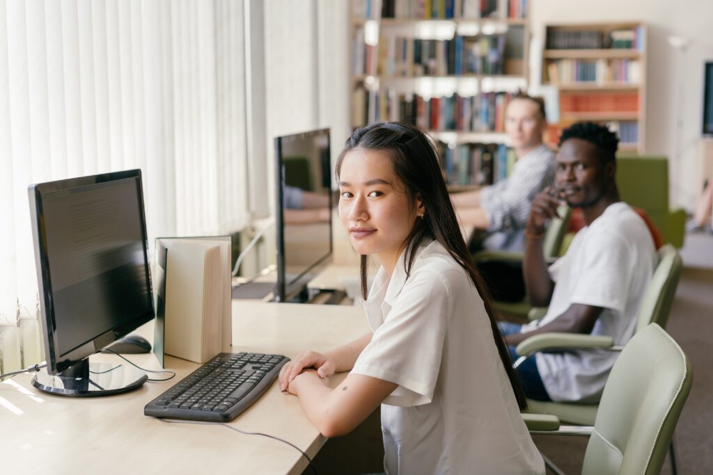 associate degree students looking in the camera