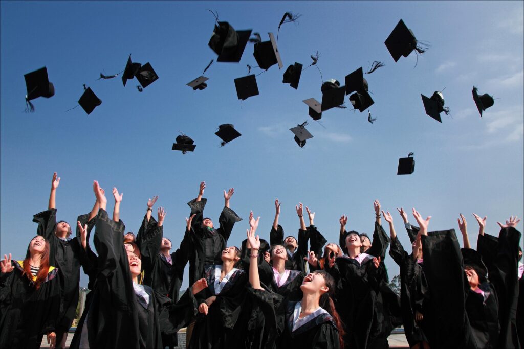 students graduating with a college degree