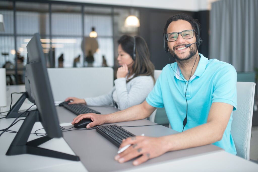 A Man and a Woman Working in a Call Center