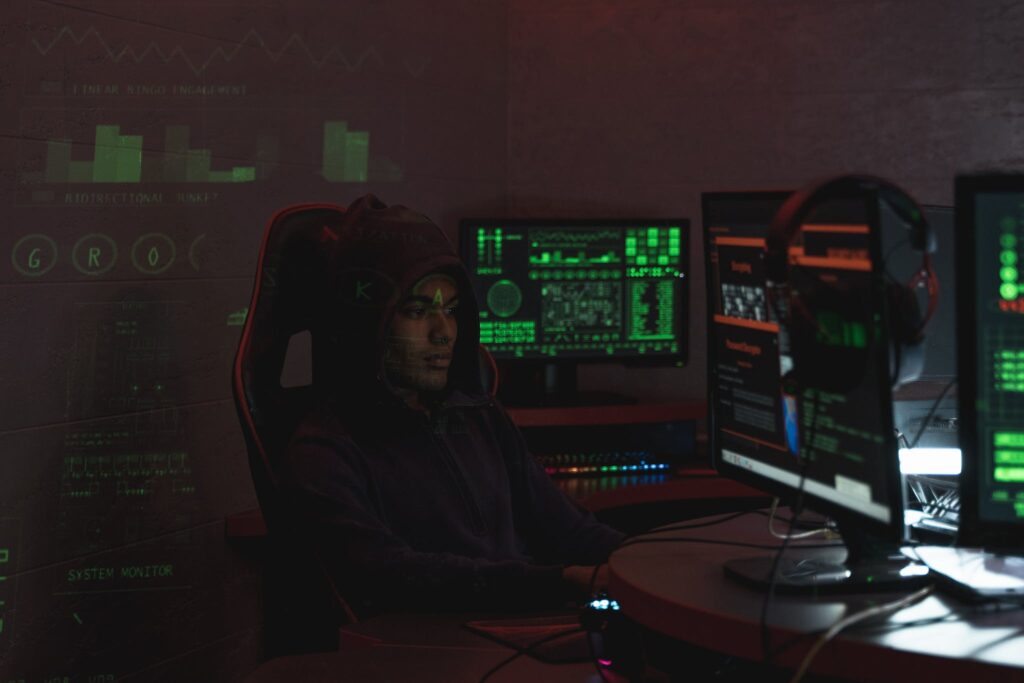 Man in Hoodie Sitting on a Chair