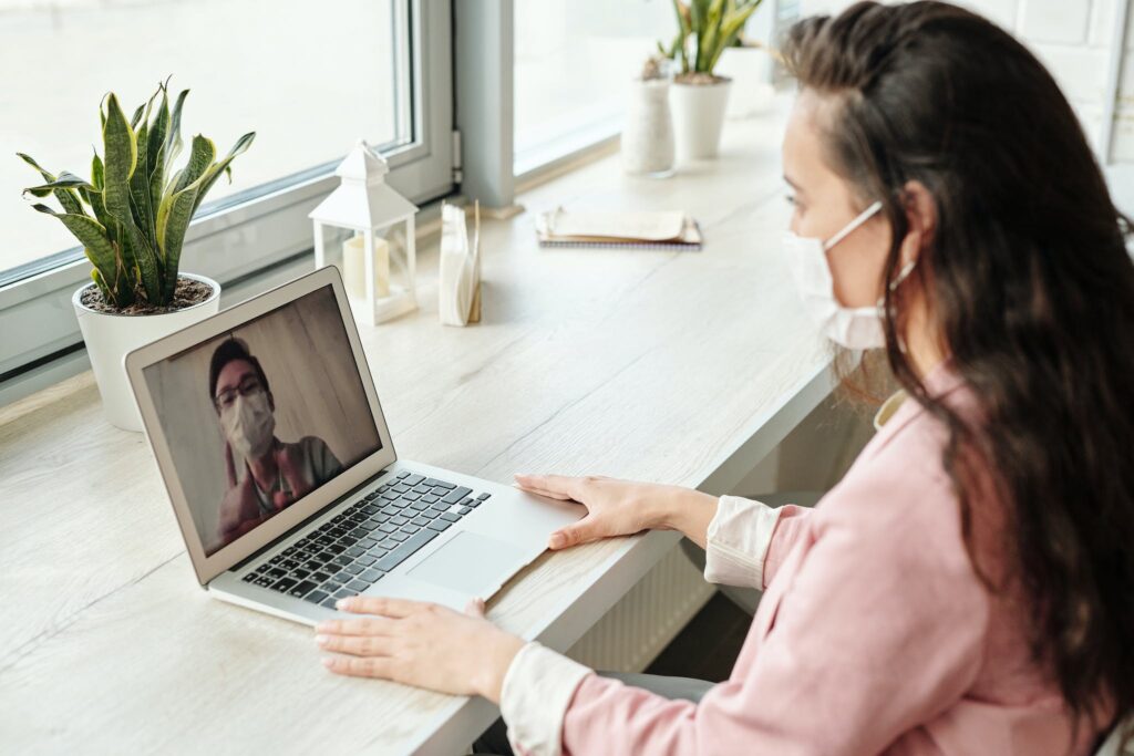 Woman Having A Video Call studying an online economics degree